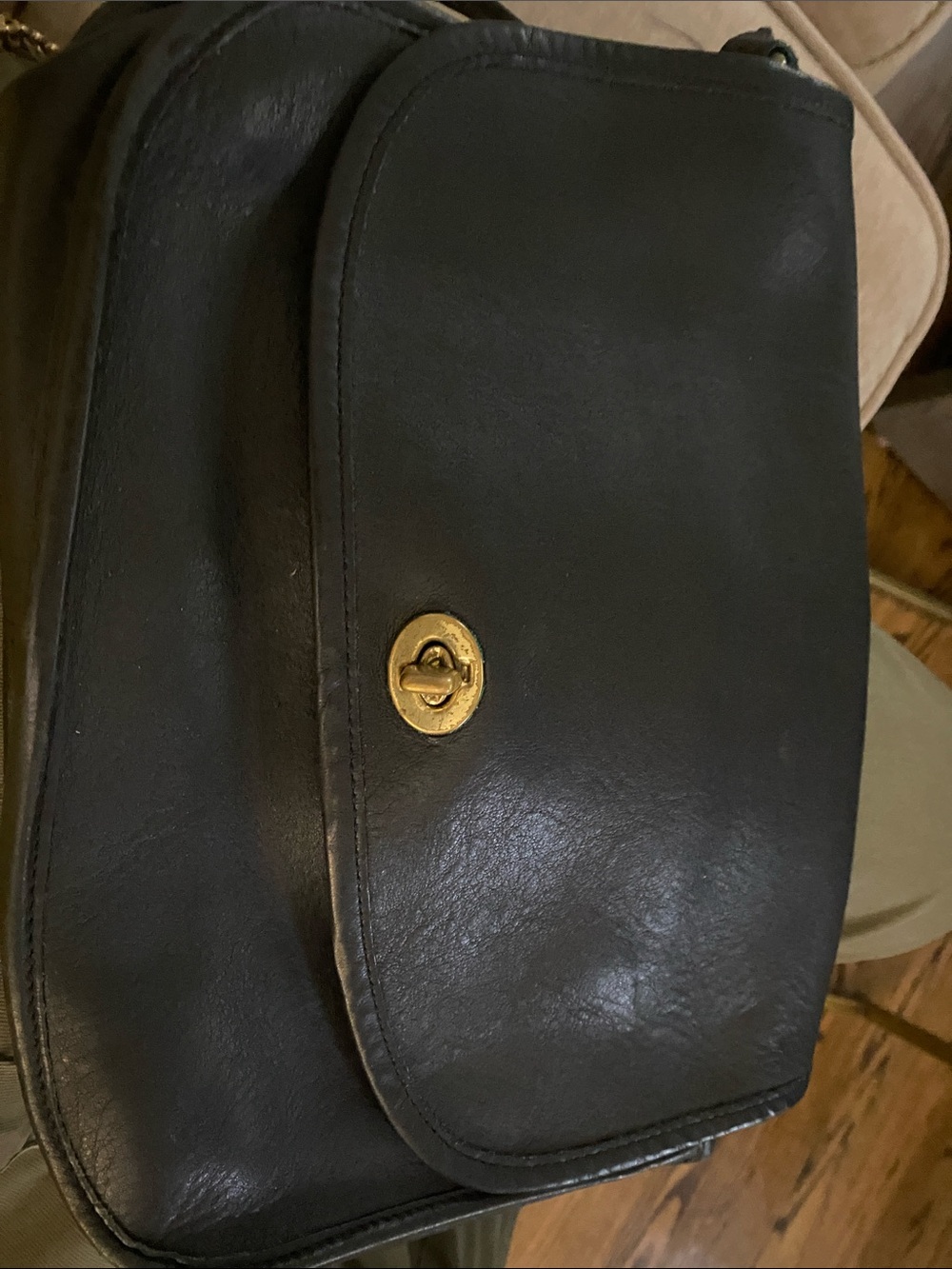 Coach Black Leather Messenger Bag with Gold-Tone Turnlock